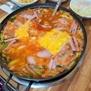 최네집안성점